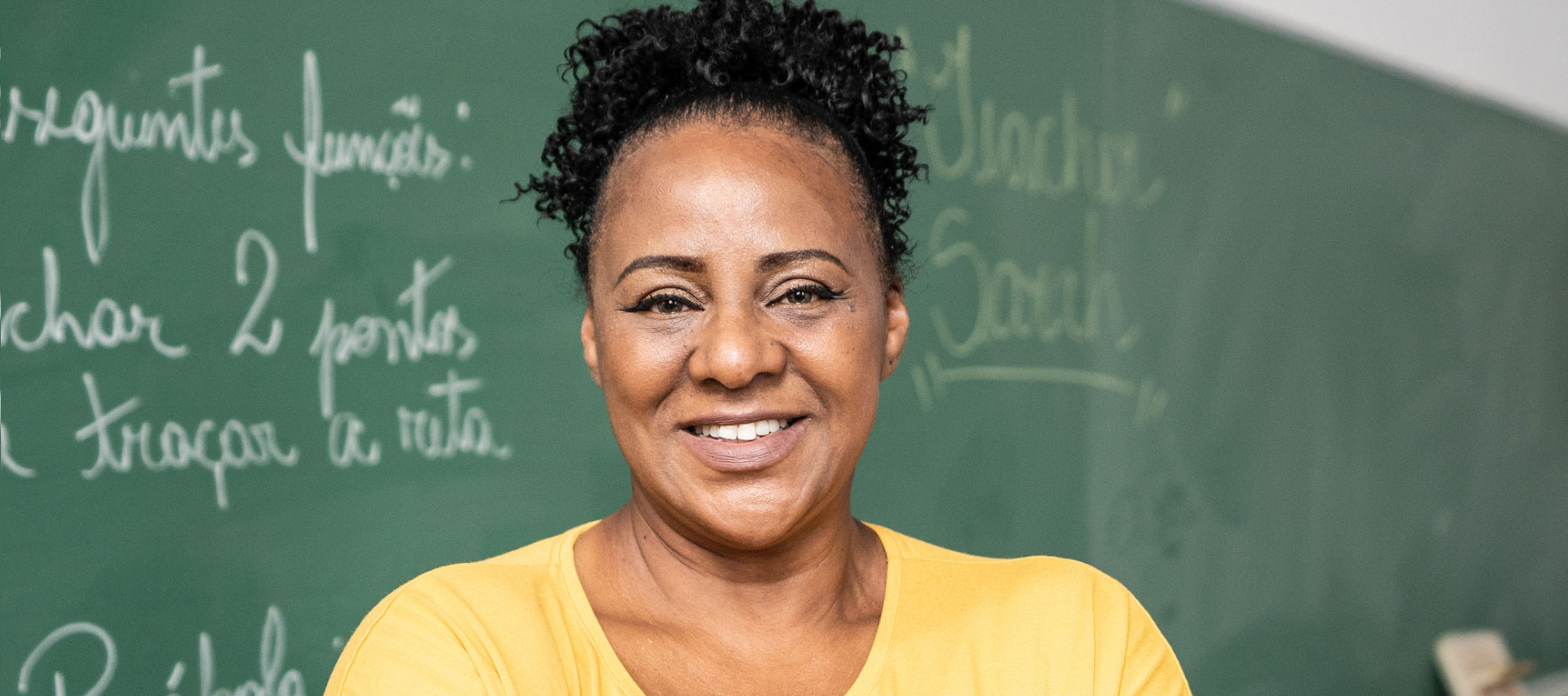 Woman smiles at the camera.