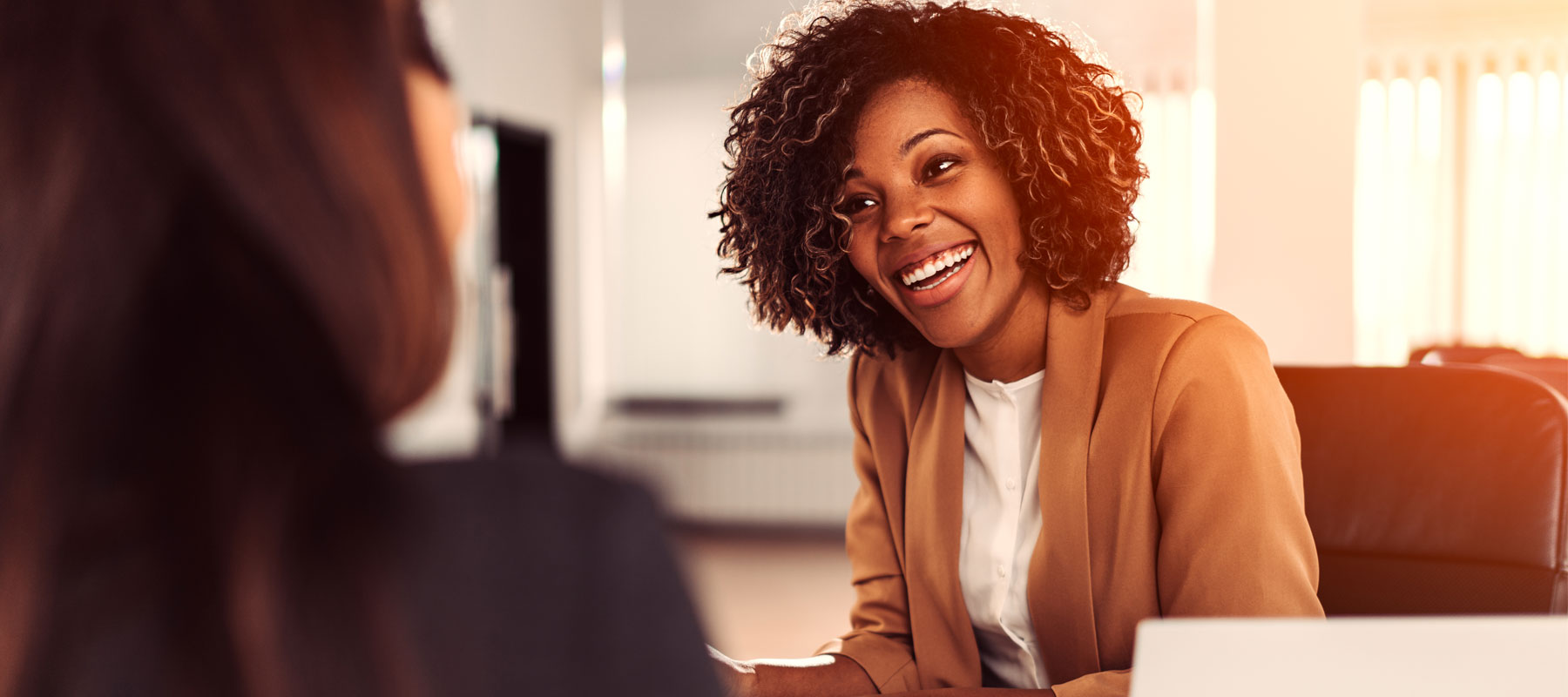Workforce development counselor working with a client.