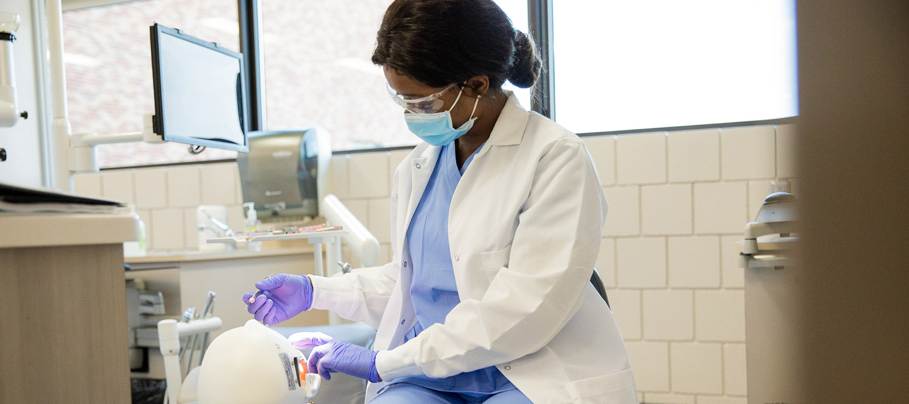 A dental hygienist at work 