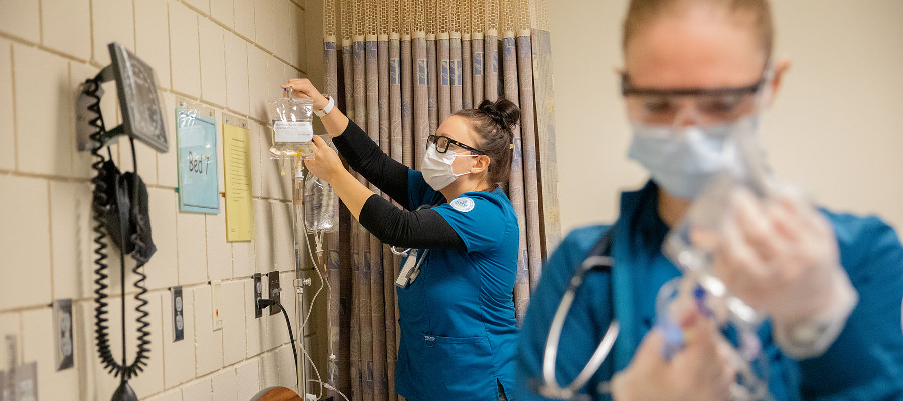 Normandale nursing students in a lab.