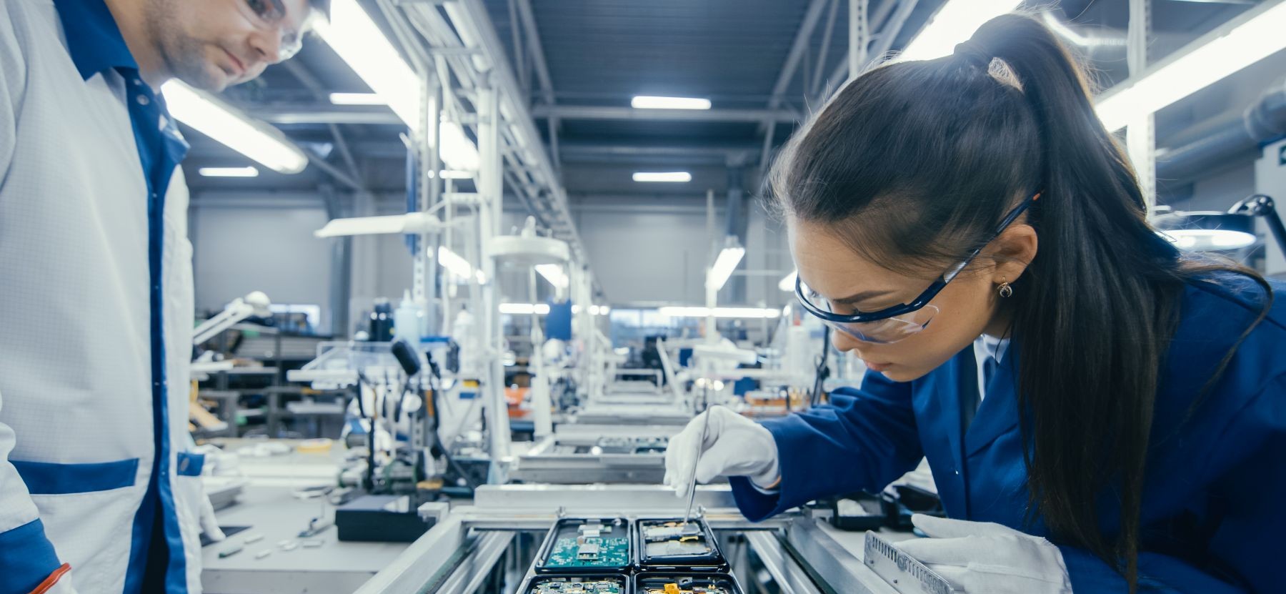Technician working at a diagnostics panel