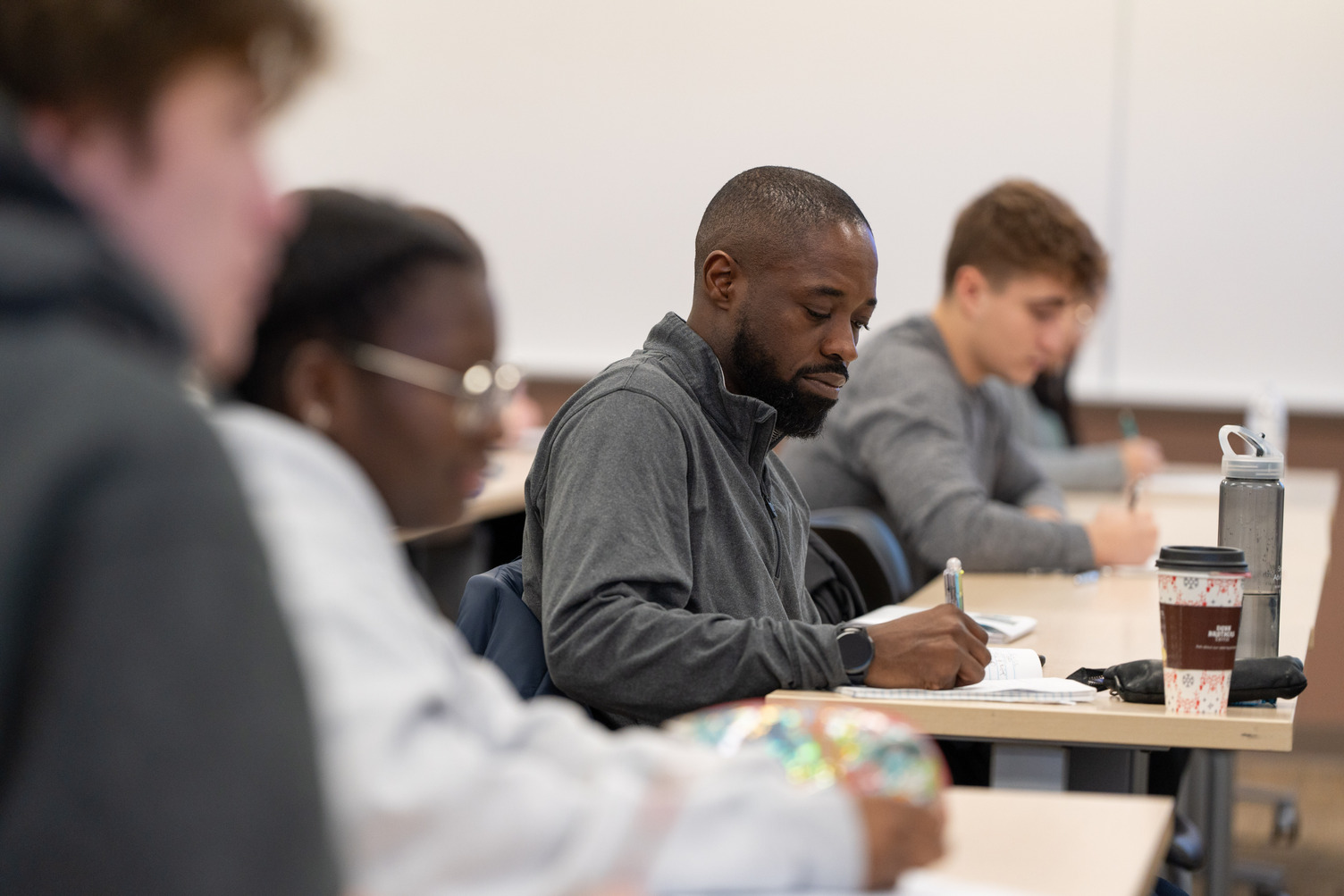 Student researching CPL options at Normandale, one of the MN community colleges with no application fee.