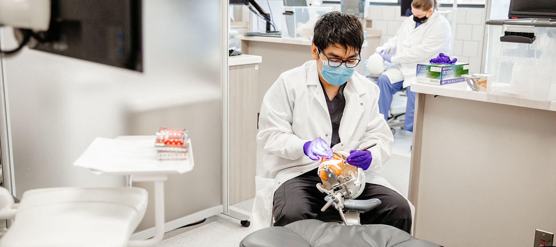 A Normandale Dental Hygiene student in lab.