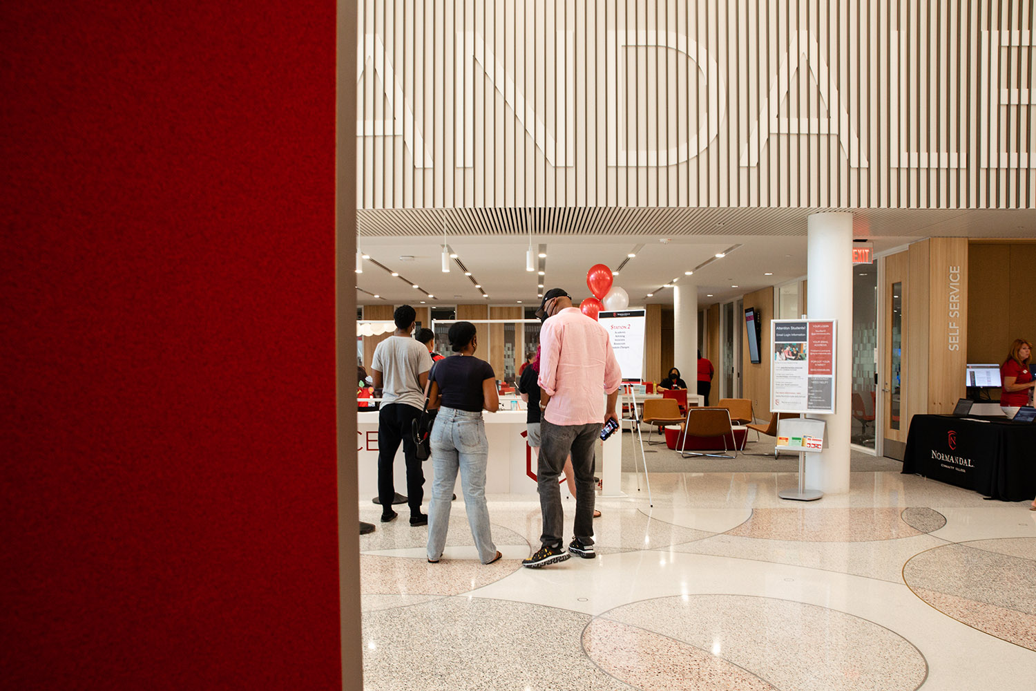 Students gather in the lobby.