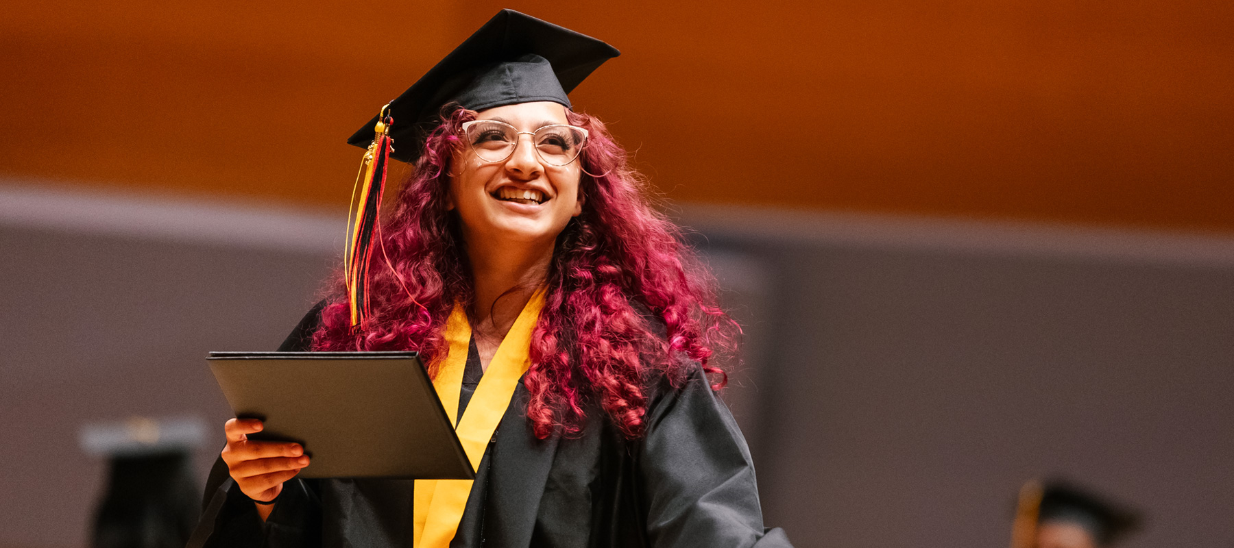 Happy Normandale Graduate with her diploma