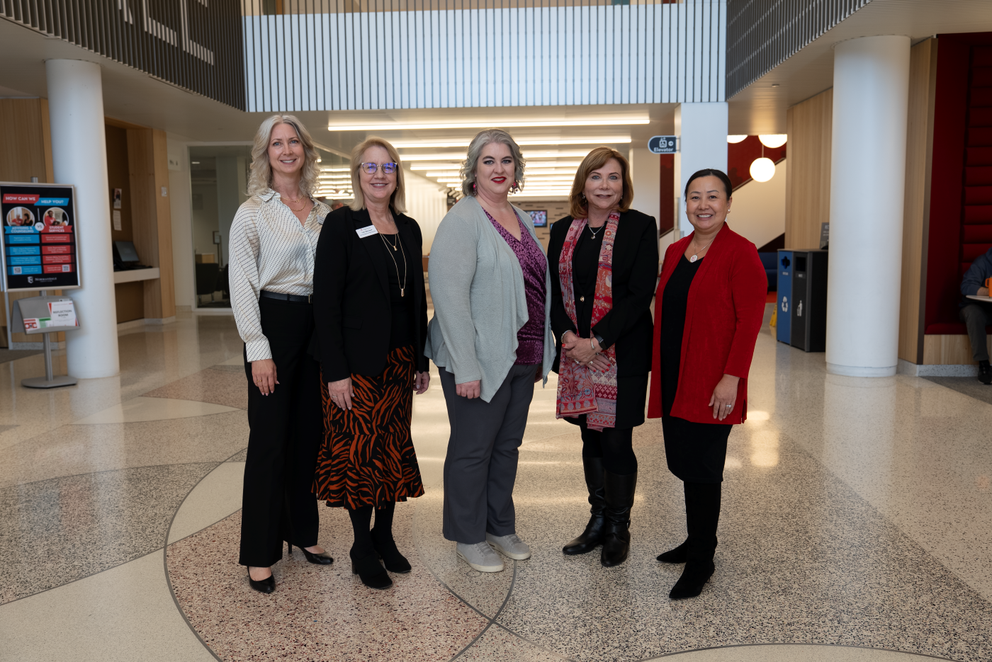 Laura Beeth group photo with Normandale administrators when she visited campus